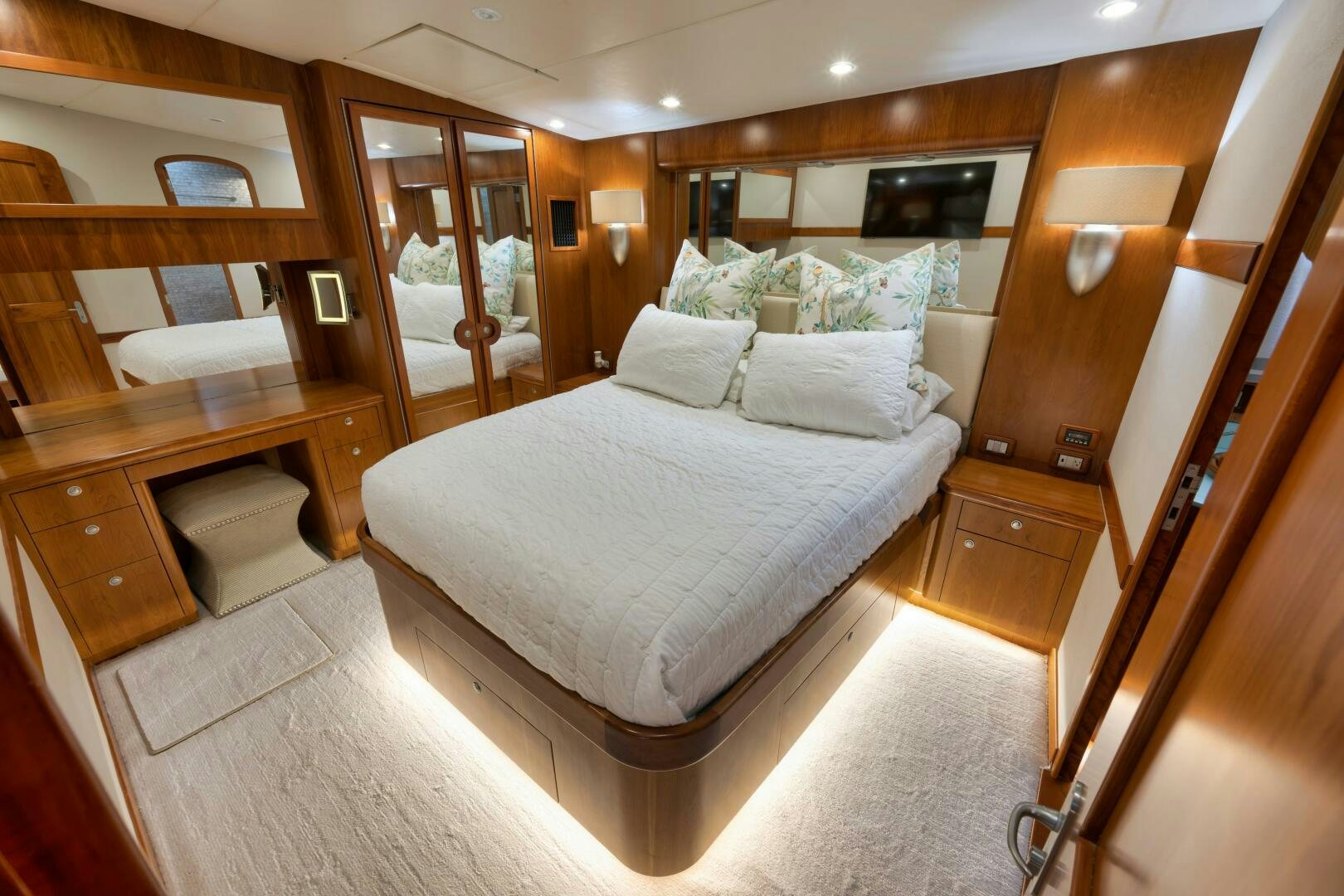 a bed in a room aboard LET  RIDE Yacht for Sale