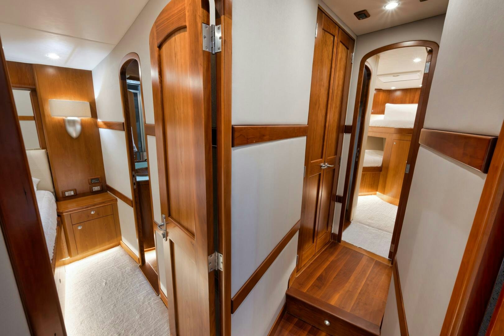 a room with wooden cabinets aboard LET  RIDE Yacht for Sale
