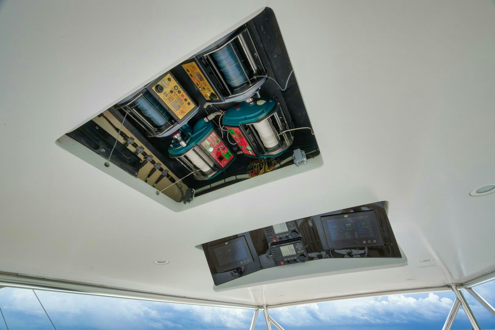 a group of computers on a table aboard LET  RIDE Yacht for Sale