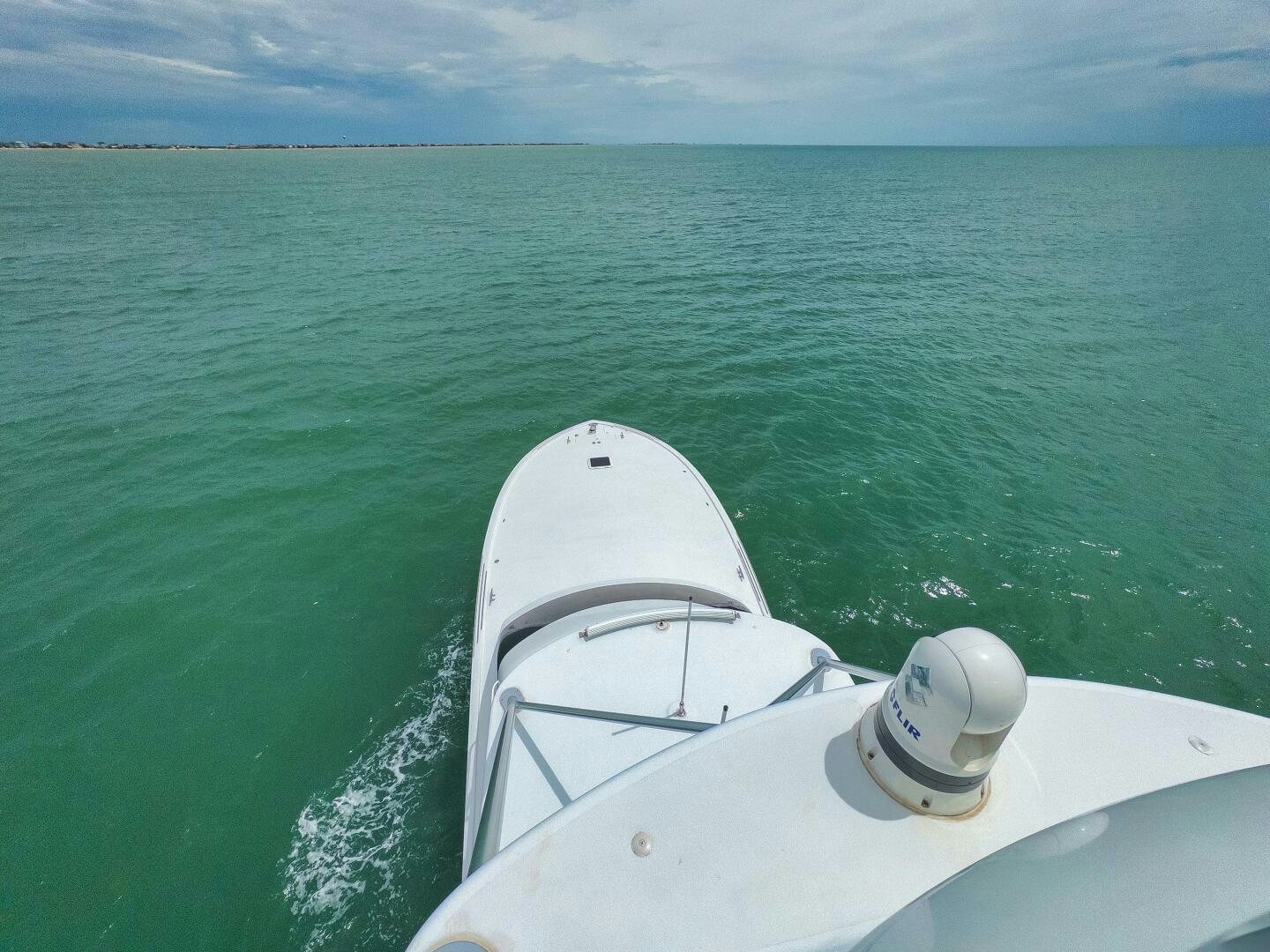 a boat on the water aboard LET  RIDE Yacht for Sale