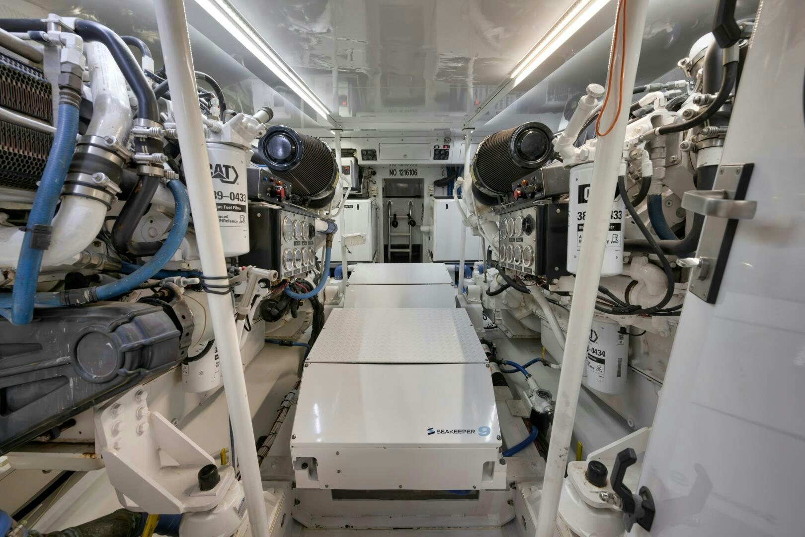 a room with several pipes aboard LET  RIDE Yacht for Sale