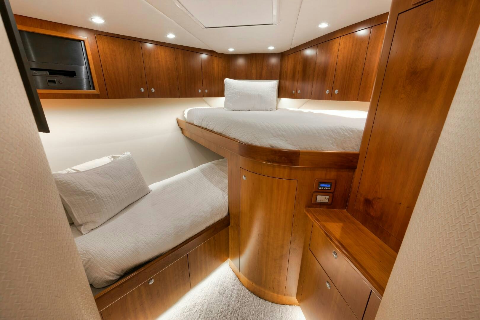 a room with a bed and a couch aboard LET  RIDE Yacht for Sale