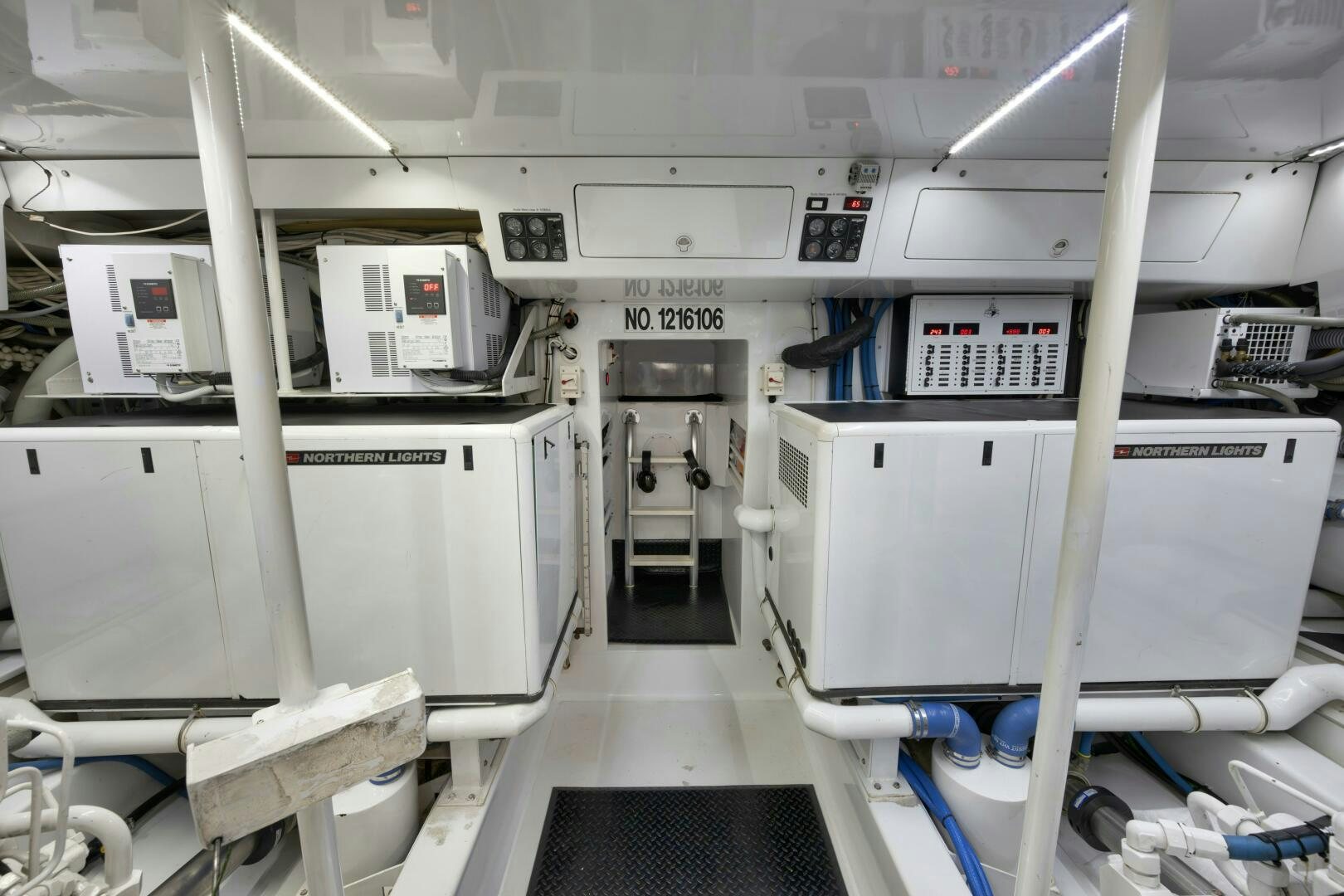 a room with white machines aboard LET  RIDE Yacht for Sale