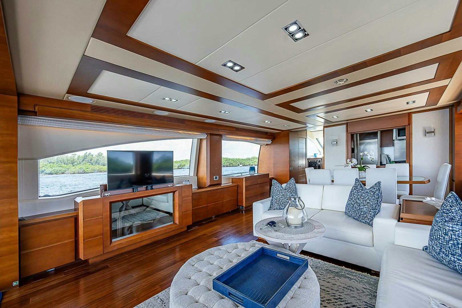 a living room with a large window aboard LADY MARIE-CLAIRE Yacht for Sale