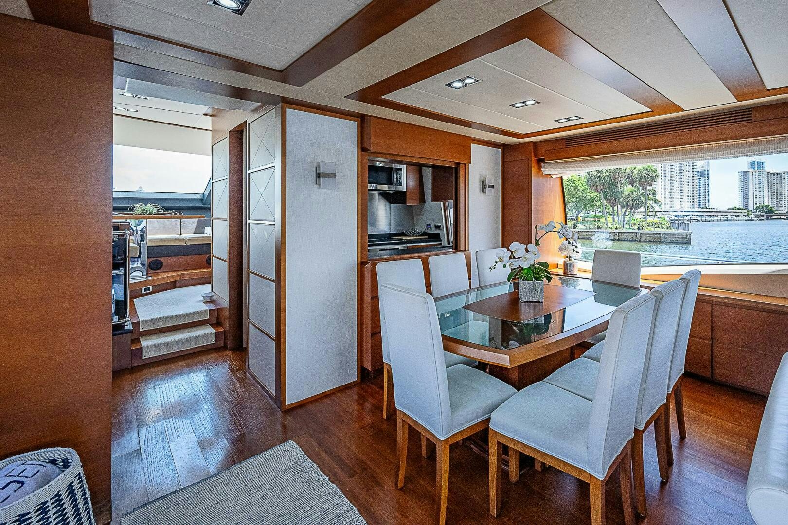 a dining room with a table and chairs aboard LADY MARIE-CLAIRE Yacht for Sale