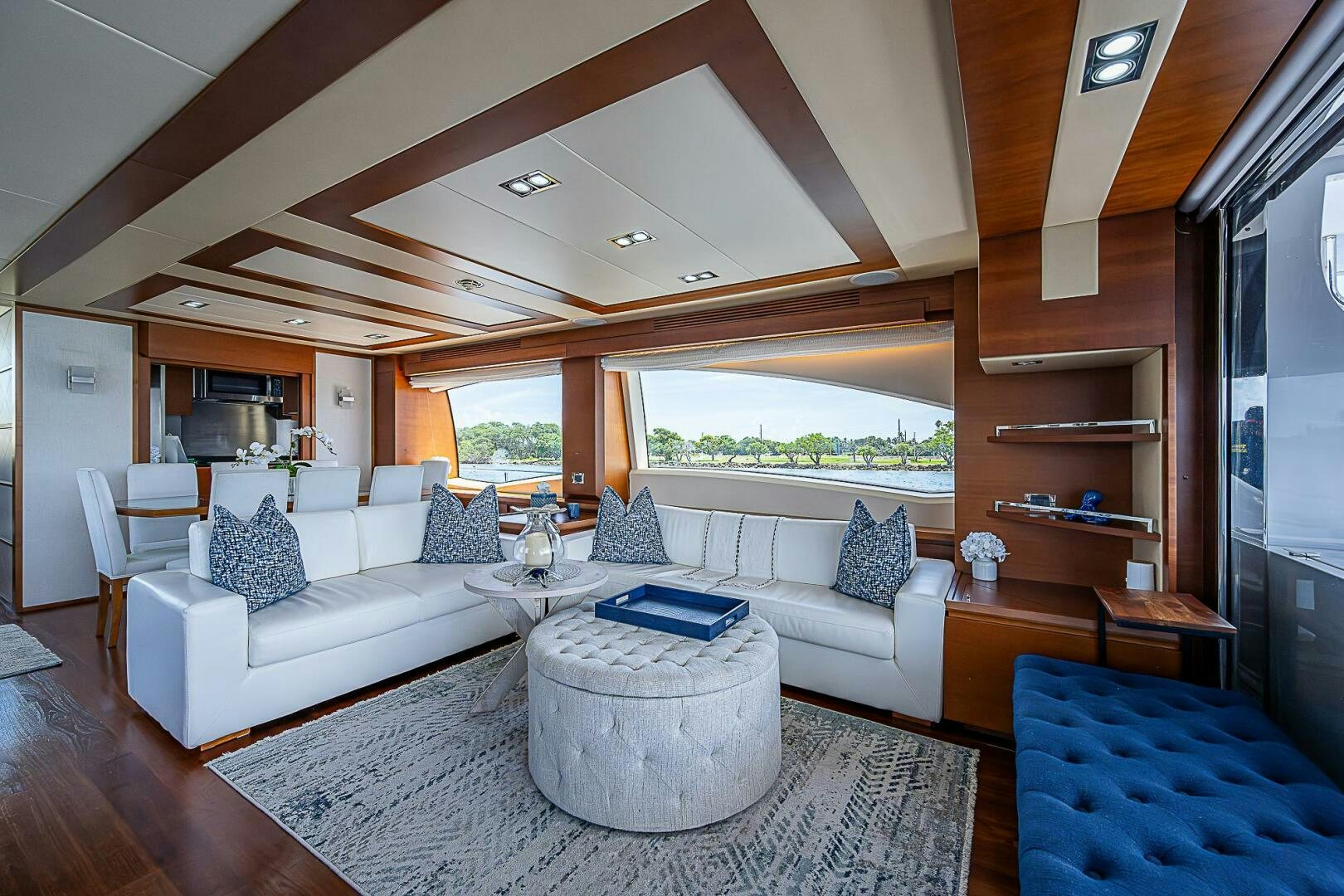 a living room with a large window aboard LADY MARIE-CLAIRE Yacht for Sale