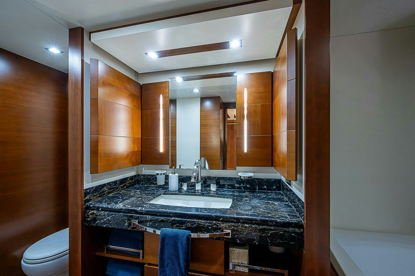 a bathroom with a marble counter top aboard LADY MARIE-CLAIRE Yacht for Sale