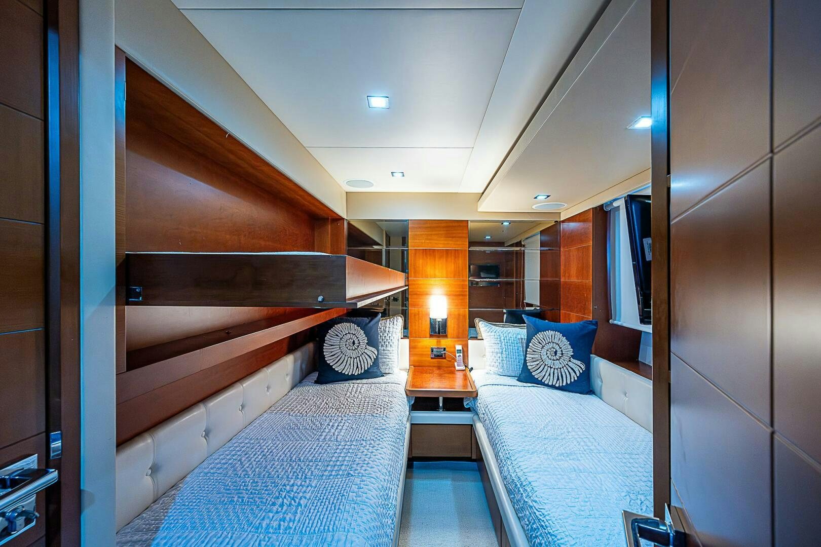 a room with a bed and a desk aboard LADY MARIE-CLAIRE Yacht for Sale