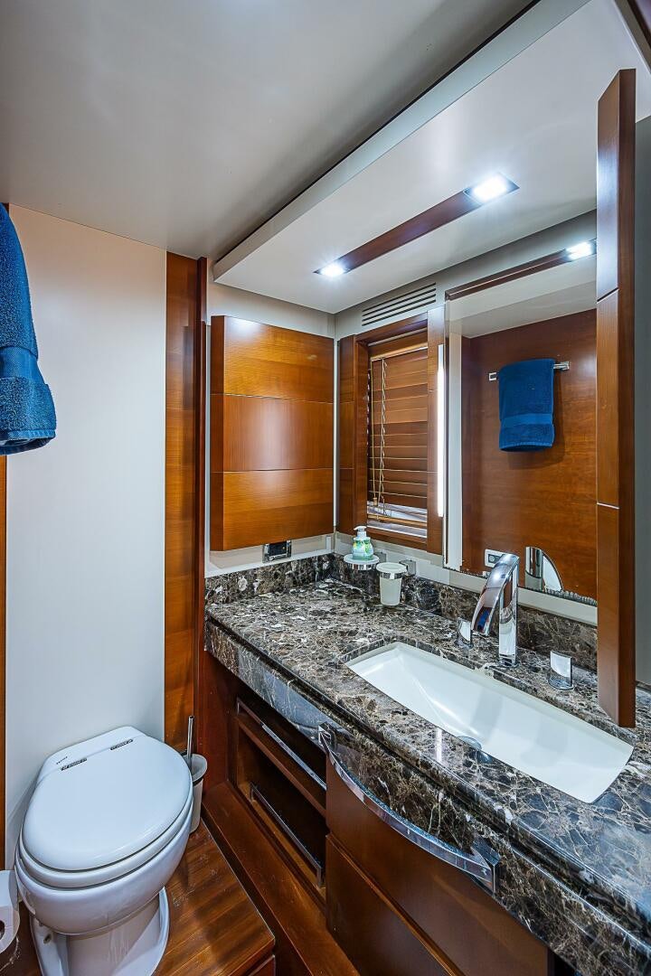 a bathroom with a large mirror aboard LADY MARIE-CLAIRE Yacht for Sale