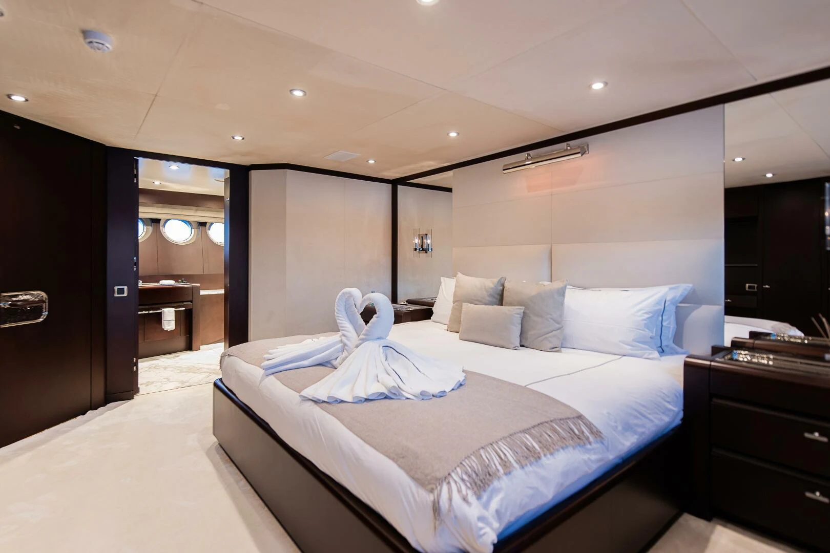 a large bed in a hotel room aboard AZTECA Yacht for Sale