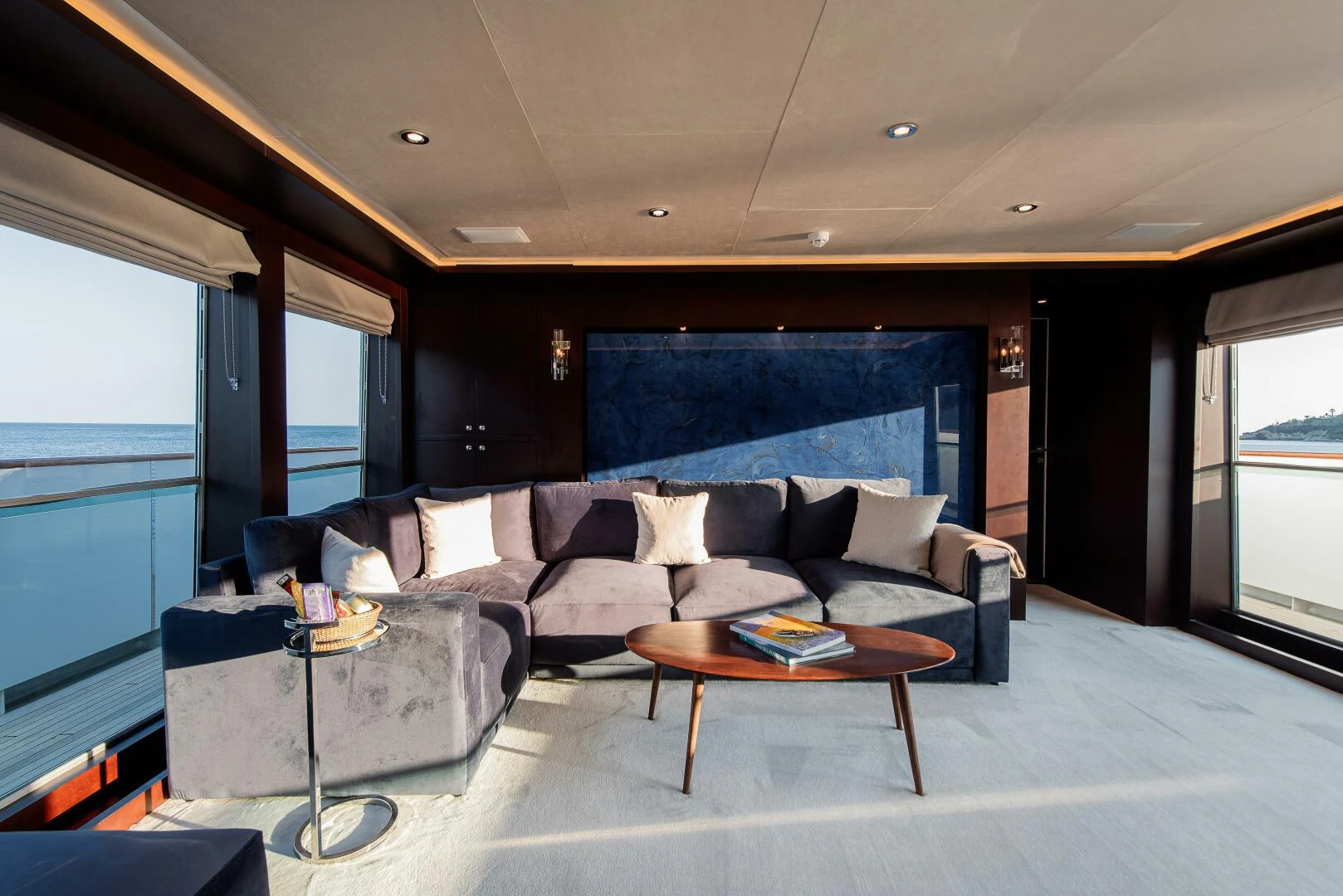 a living room with a couch and a table aboard AZTECA Yacht for Sale