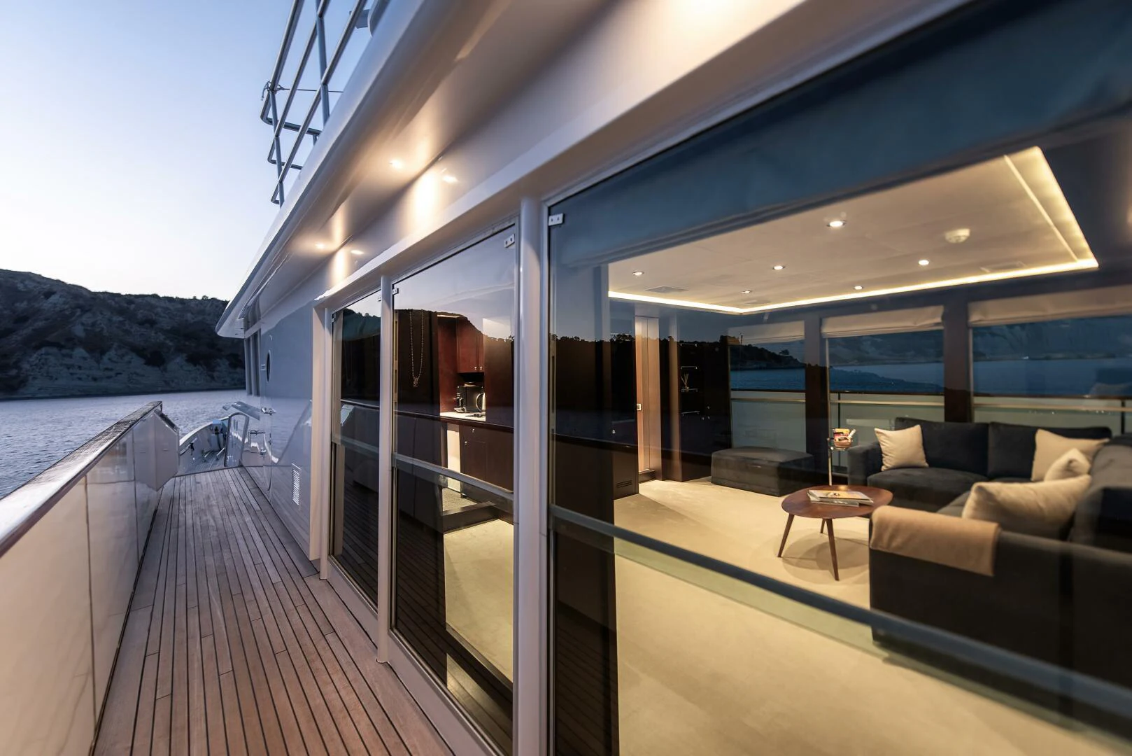 a deck with a view of the ocean and the deck aboard AZTECA Yacht for Sale