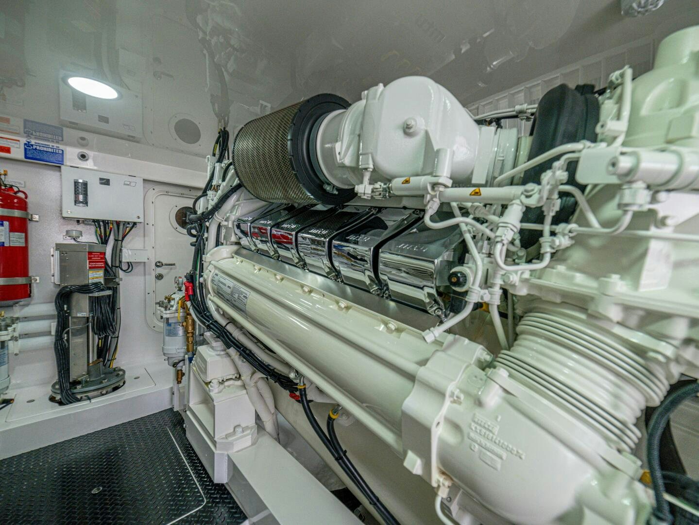 a white machine with a large white object on it aboard PURA VIDA Yacht for Sale