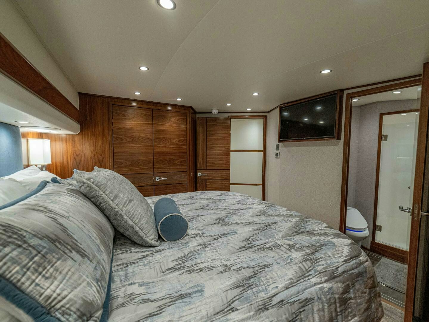 a bed in a room aboard PURA VIDA Yacht for Sale