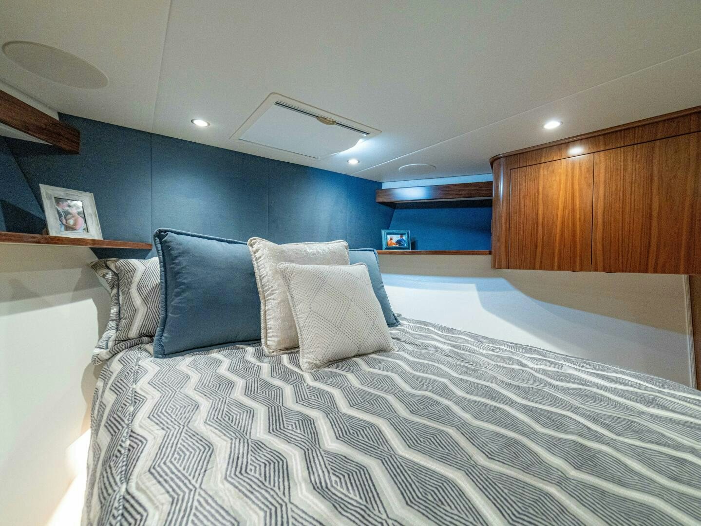 a bed with pillows aboard PURA VIDA Yacht for Sale