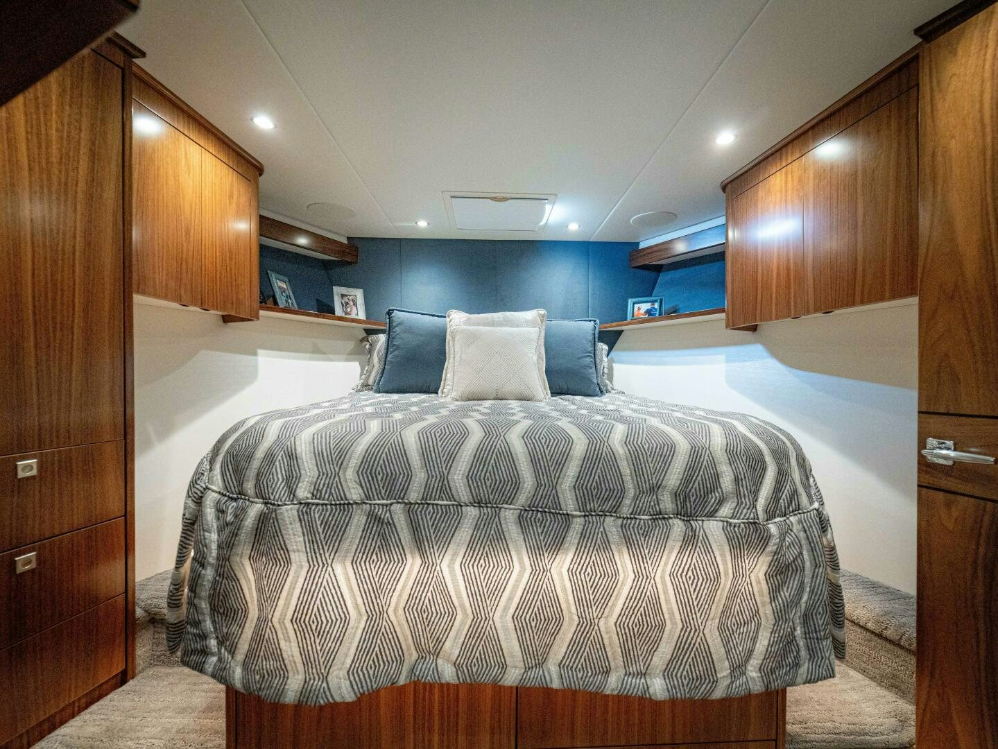 a bed in a room aboard PURA VIDA Yacht for Sale