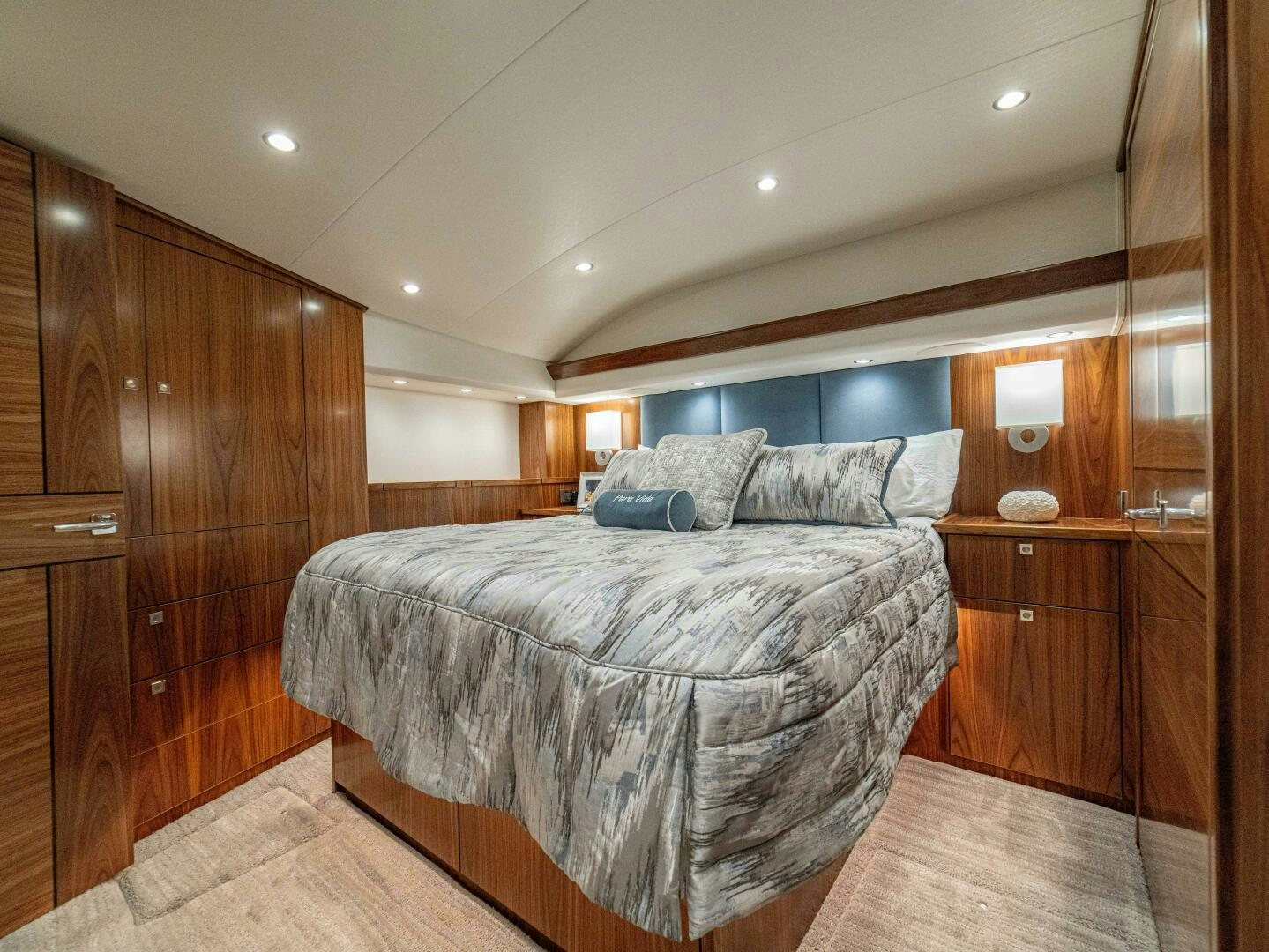 a bed in a room aboard PURA VIDA Yacht for Sale