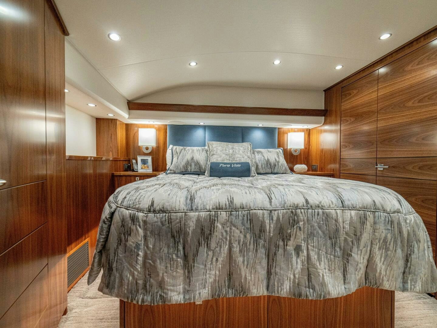 a bed in a room aboard PURA VIDA Yacht for Sale