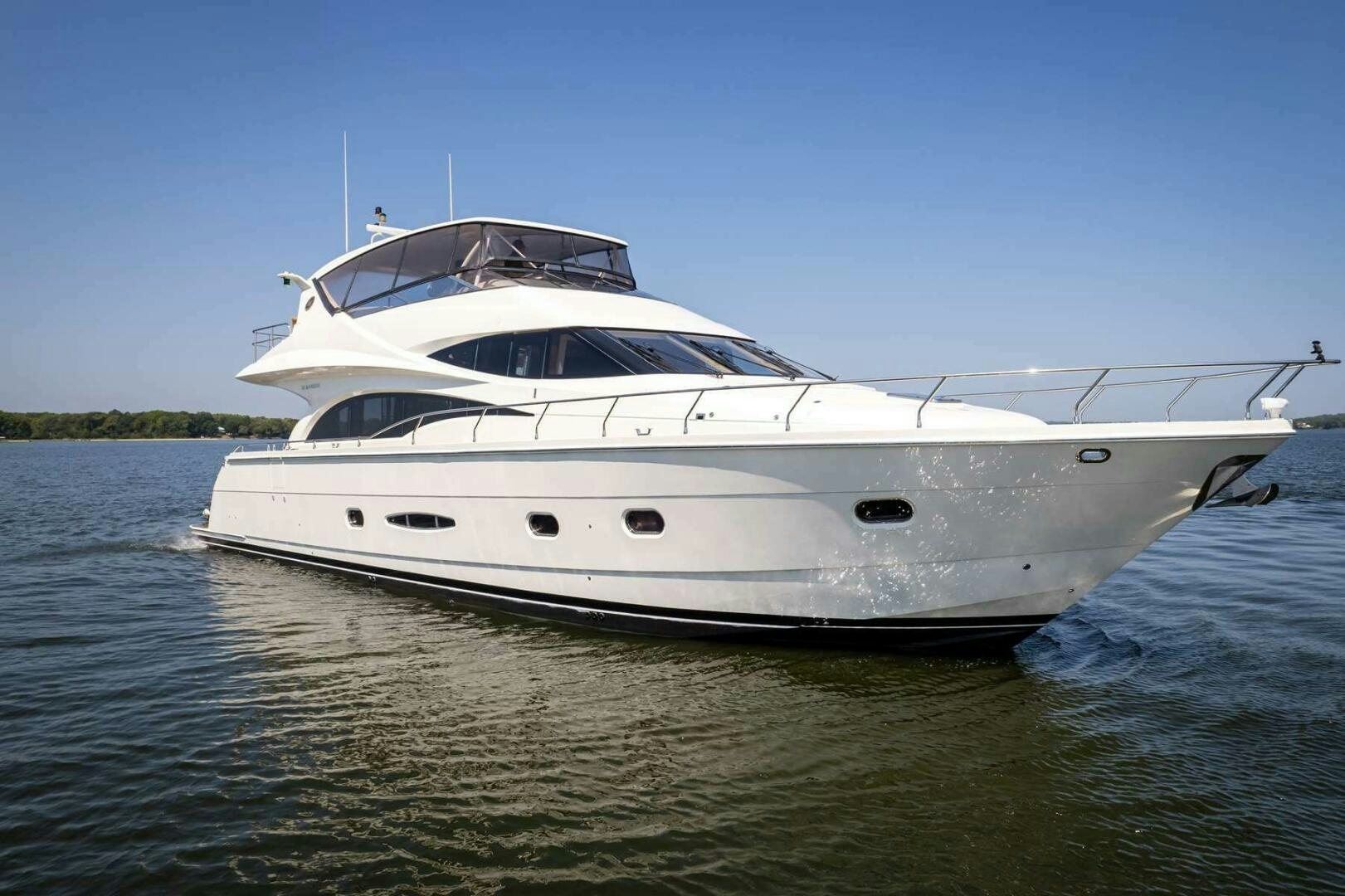 a white yacht on the water aboard NAVETTE Yacht for Sale
