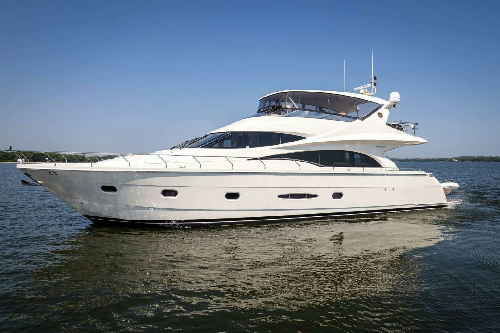 a white yacht on the water aboard NAVETTE Yacht for Sale