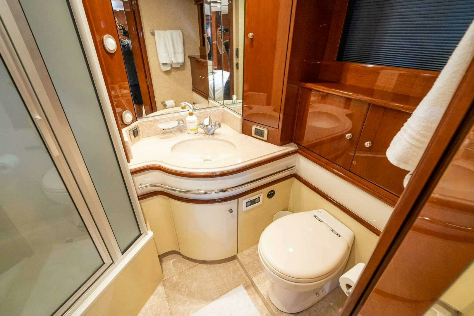 a bathroom with a sink and toilet aboard NAVETTE Yacht for Sale