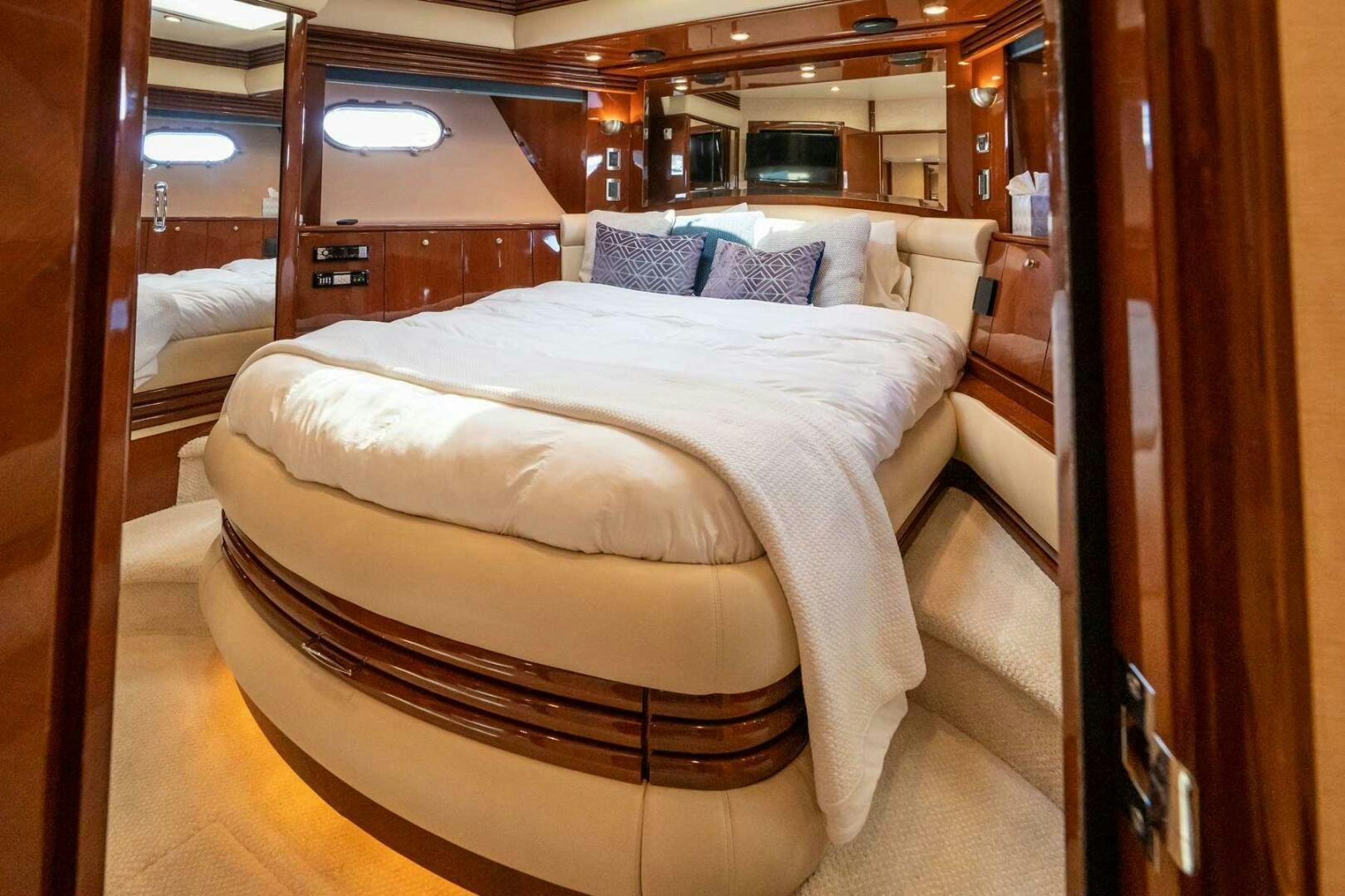 a bed in a room aboard NAVETTE Yacht for Sale