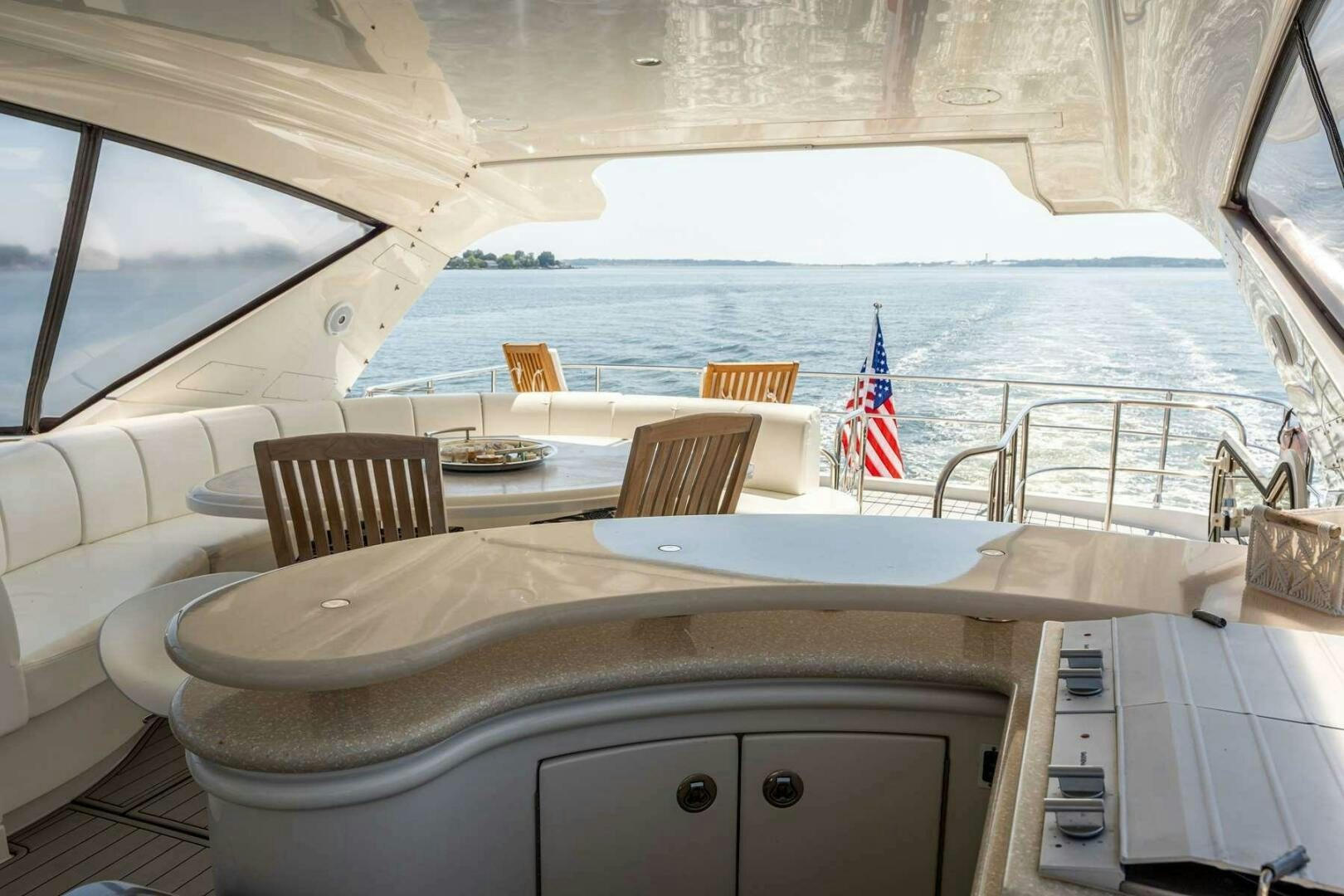 a large white bathtub with a flag on the side aboard NAVETTE Yacht for Sale