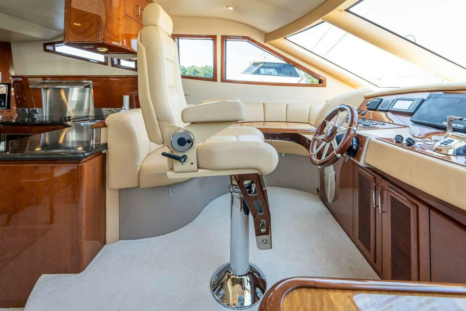 a car with a seat aboard NAVETTE Yacht for Sale