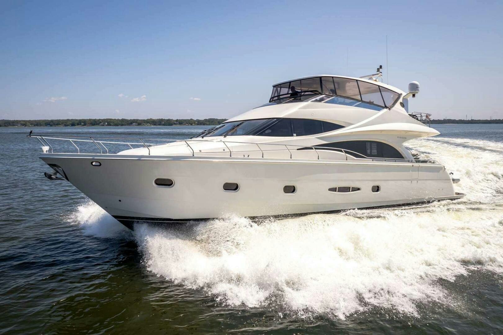 a white yacht on the water aboard NAVETTE Yacht for Sale