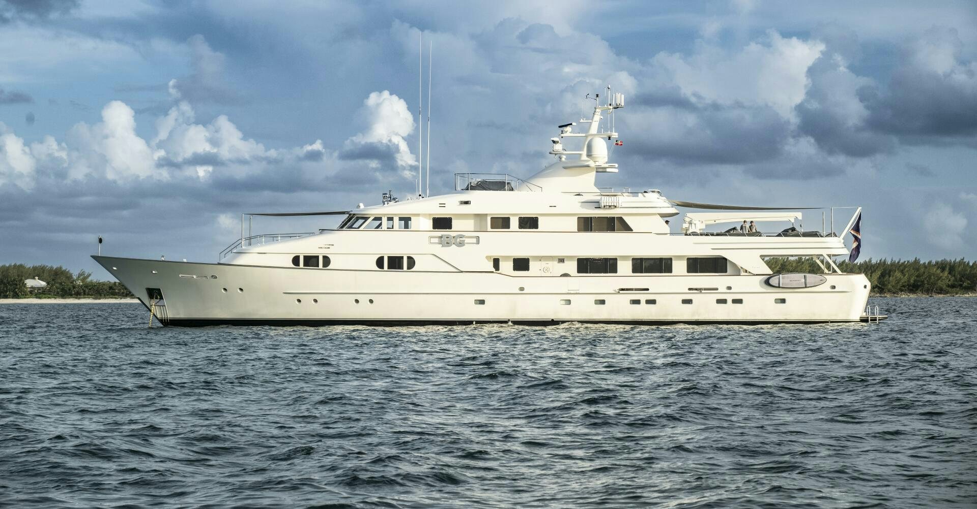a large white ship in the water aboard BG Yacht for Sale