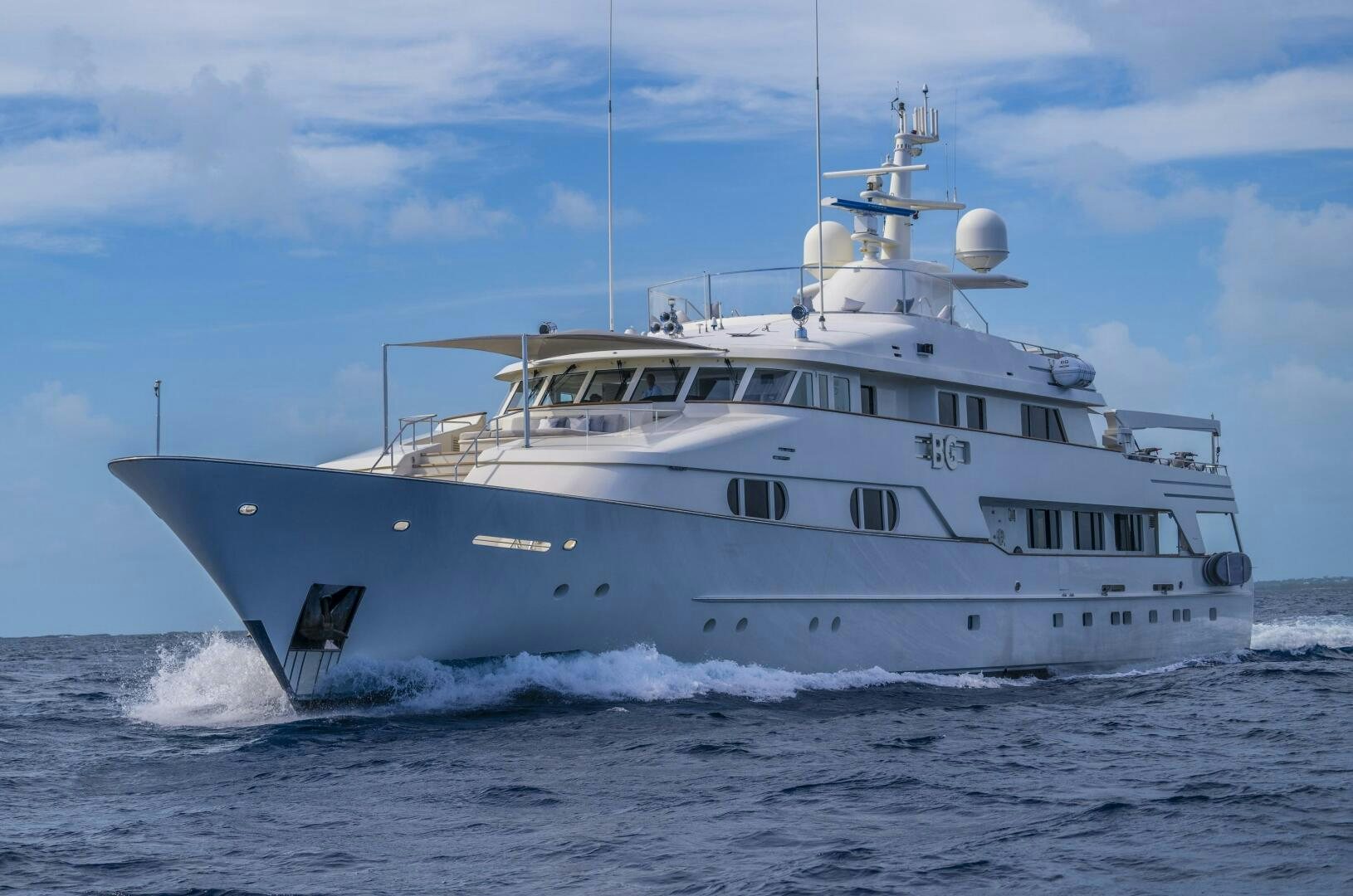 a large white boat aboard BG Yacht for Sale