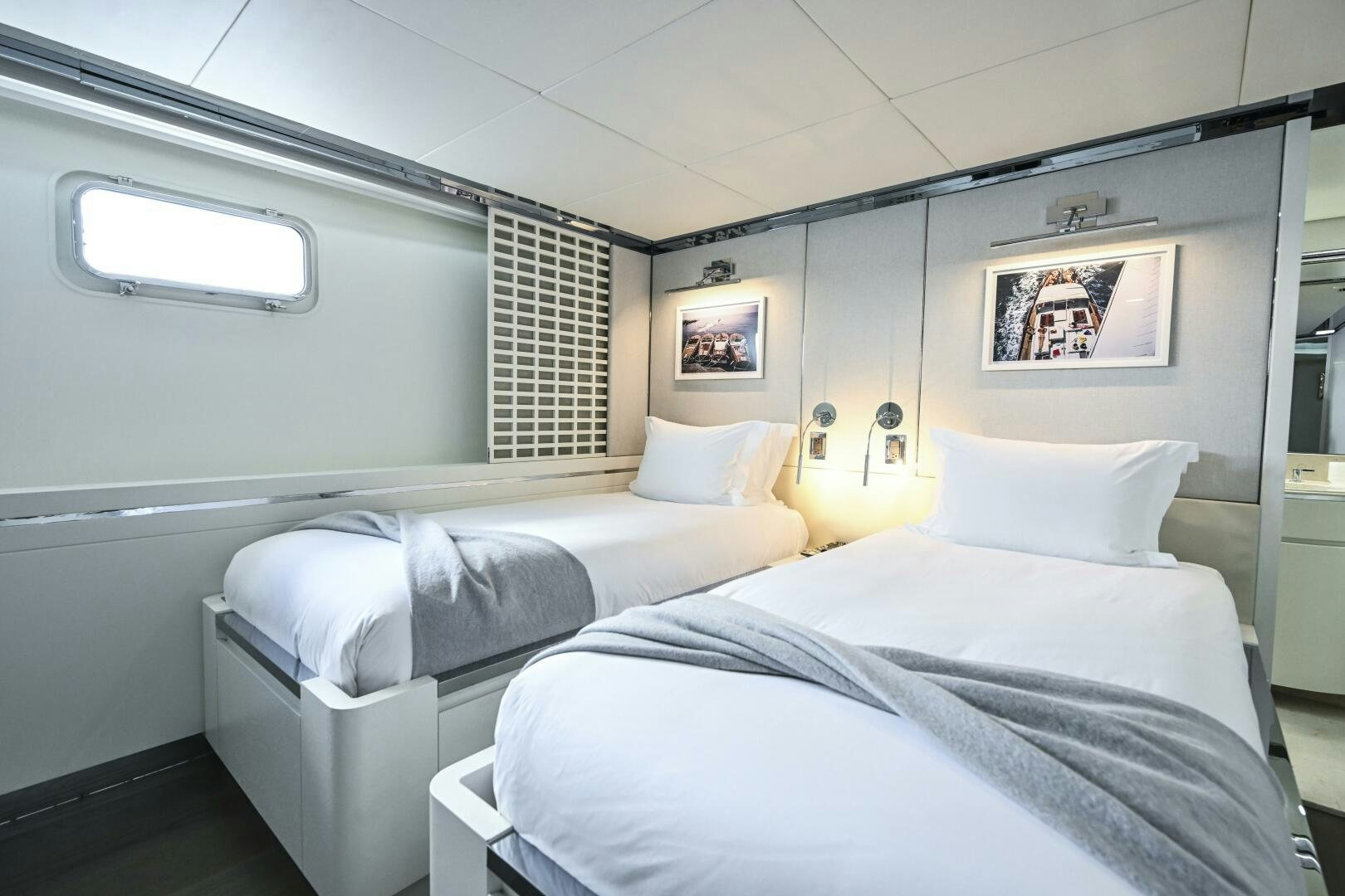 a couple of beds in a room aboard BG Yacht for Sale