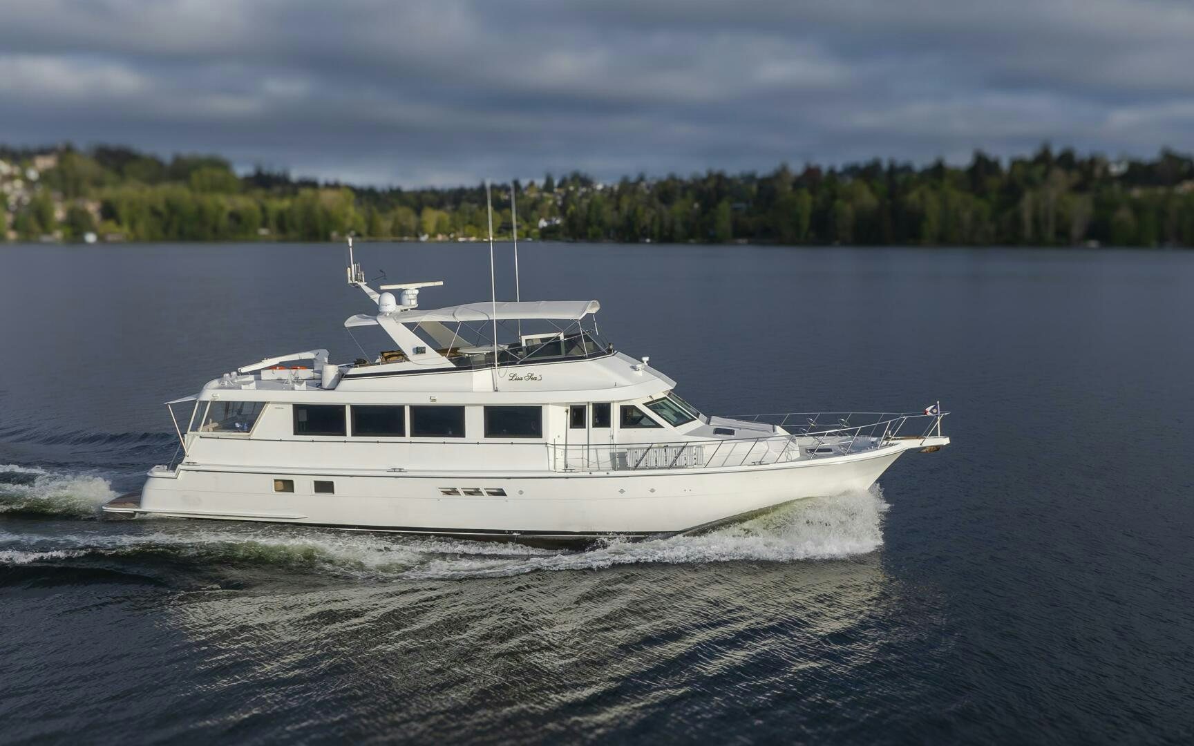a white boat on the water aboard LISA SEA I Yacht for Sale