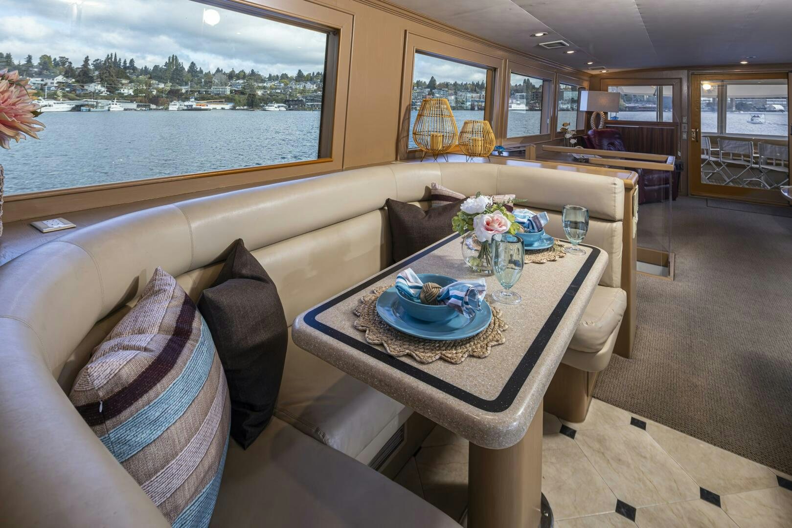 a dining table with a plate of food on it aboard LISA SEA I Yacht for Sale
