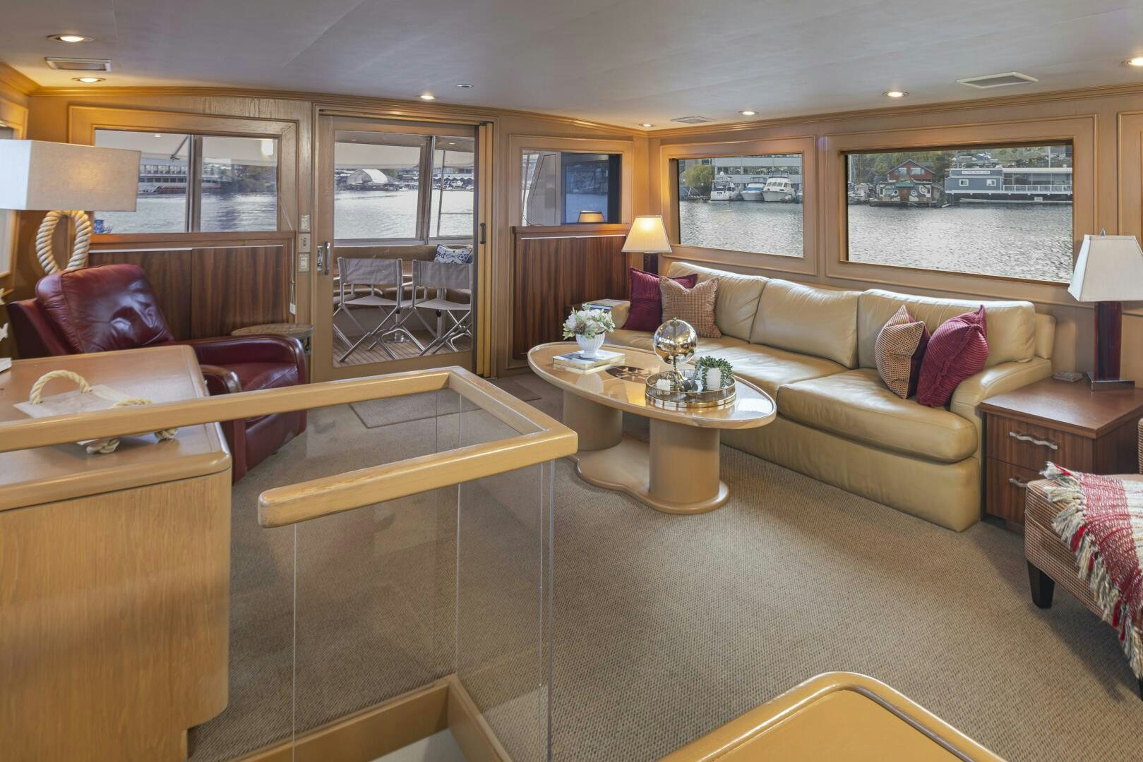 a living room with a couch and a coffee table aboard LISA SEA I Yacht for Sale