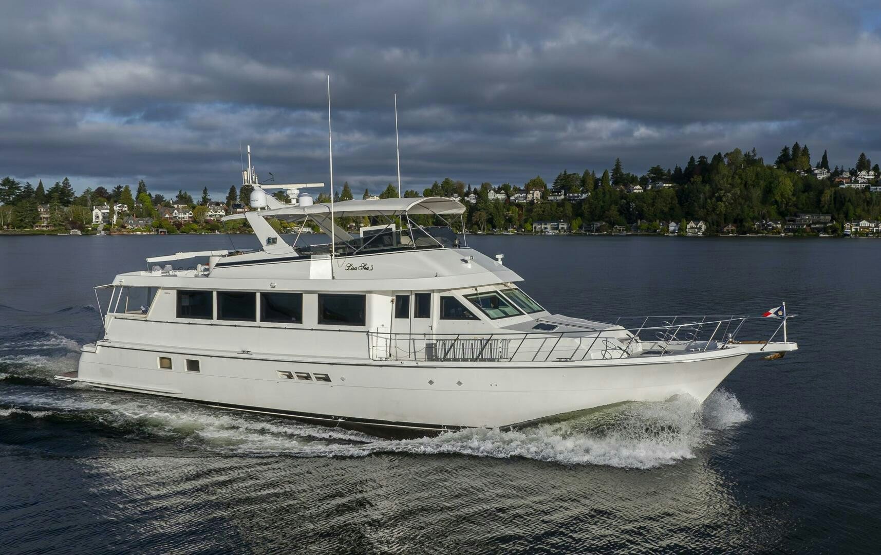 a white boat on the water aboard LISA SEA I Yacht for Sale