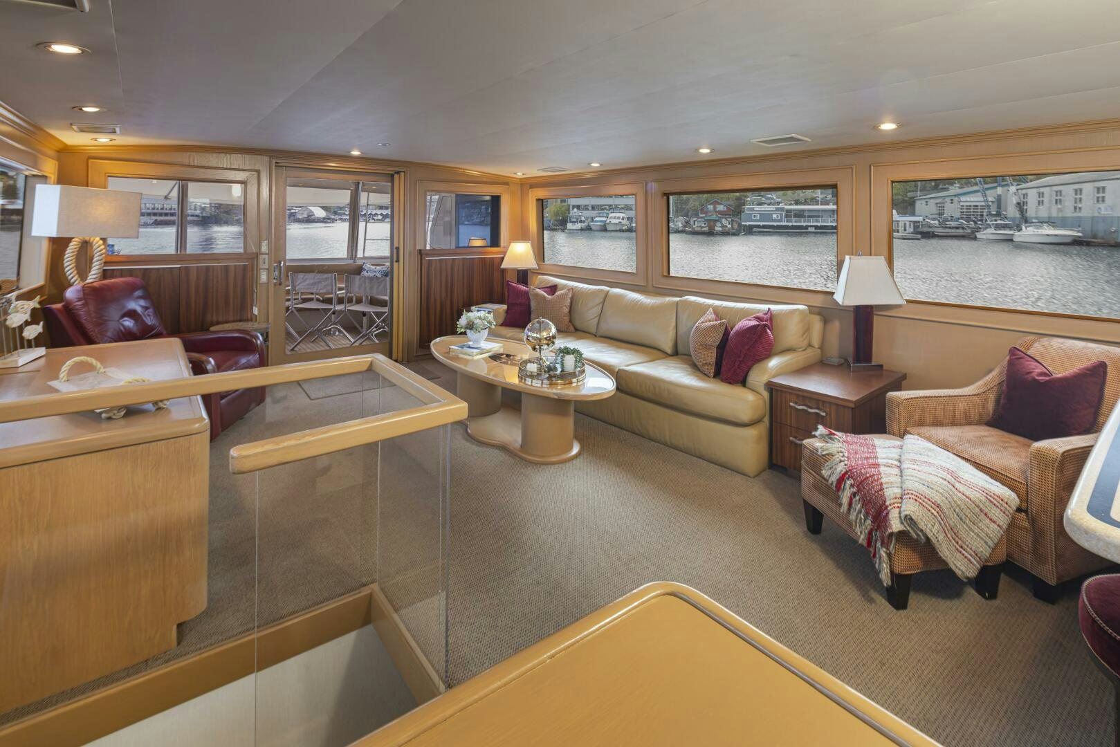 a living room with a couch and a table aboard LISA SEA I Yacht for Sale