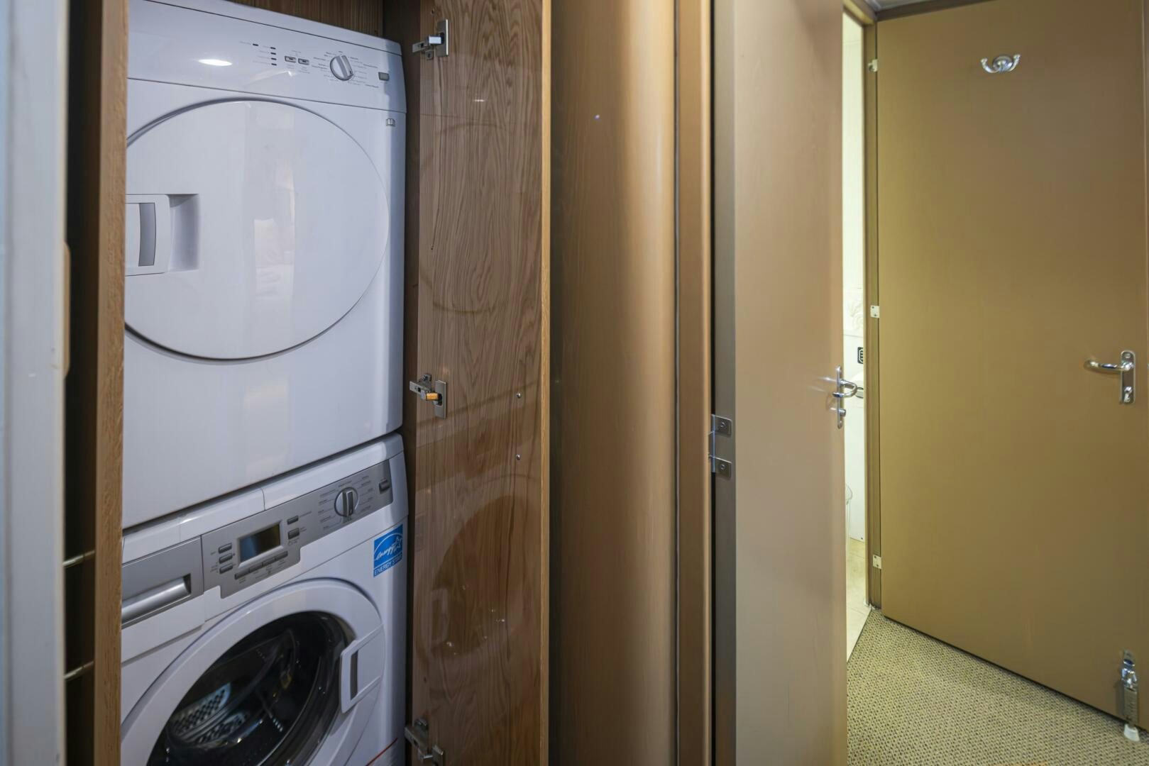 a washing machine in a room aboard LISA SEA I Yacht for Sale