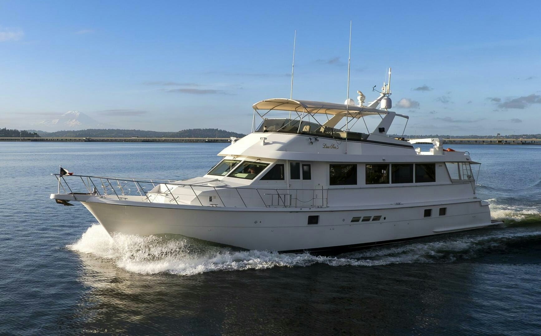 a white boat on the water aboard LISA SEA I Yacht for Sale