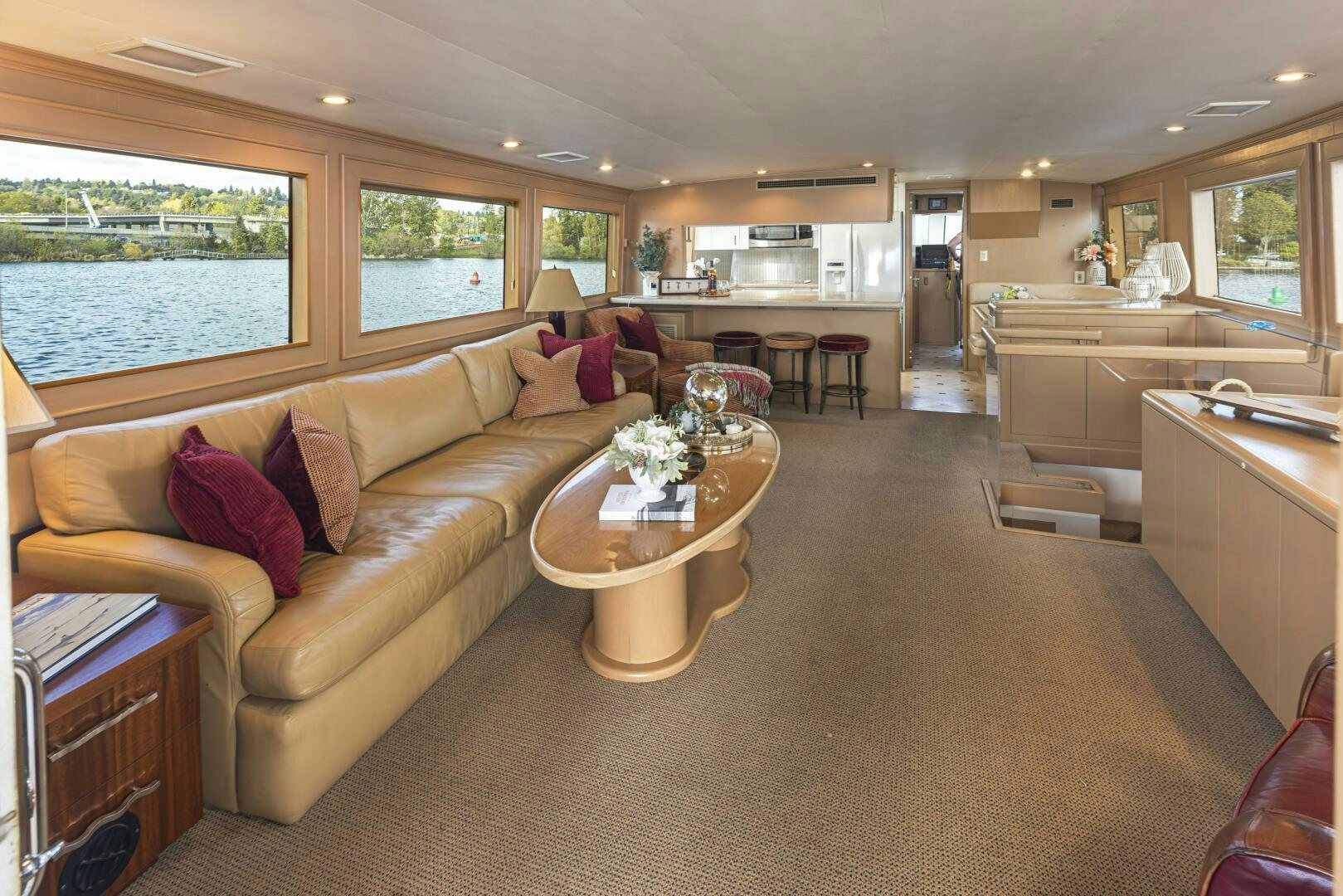 a living room with a couch and a table aboard LISA SEA I Yacht for Sale