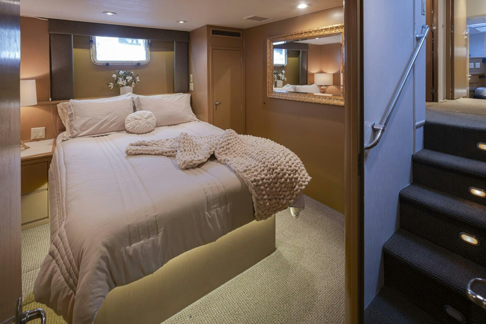 a bed in a room aboard LISA SEA I Yacht for Sale