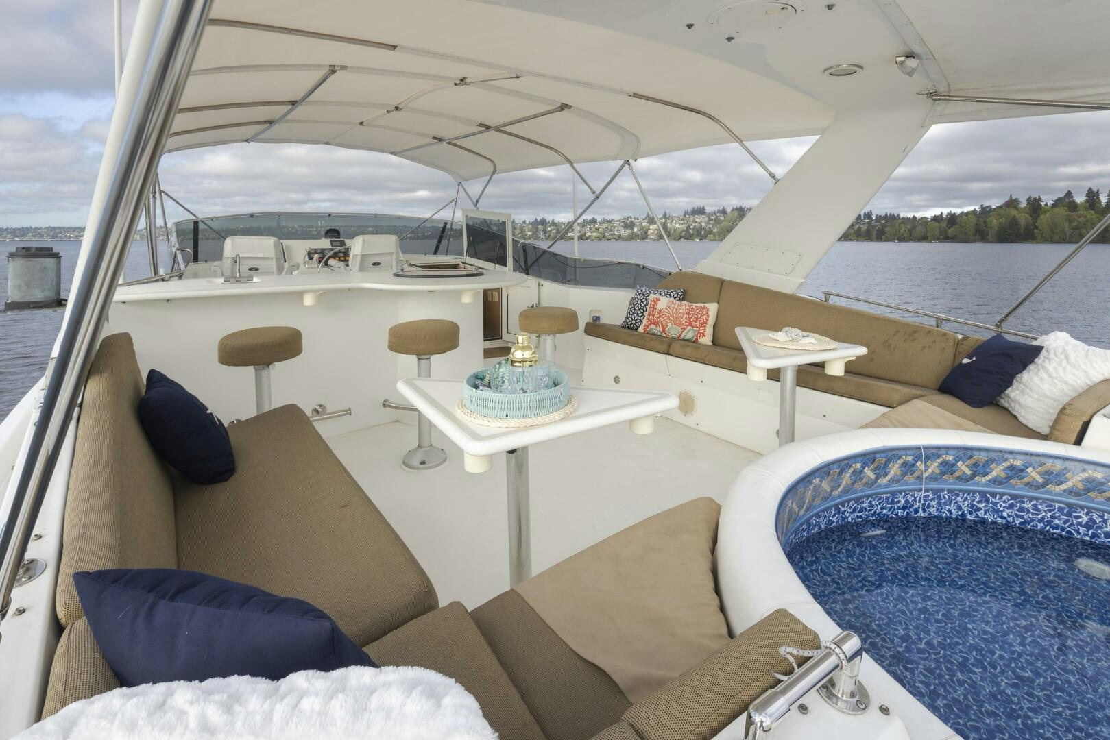 a tent with a table and chairs aboard LISA SEA I Yacht for Sale