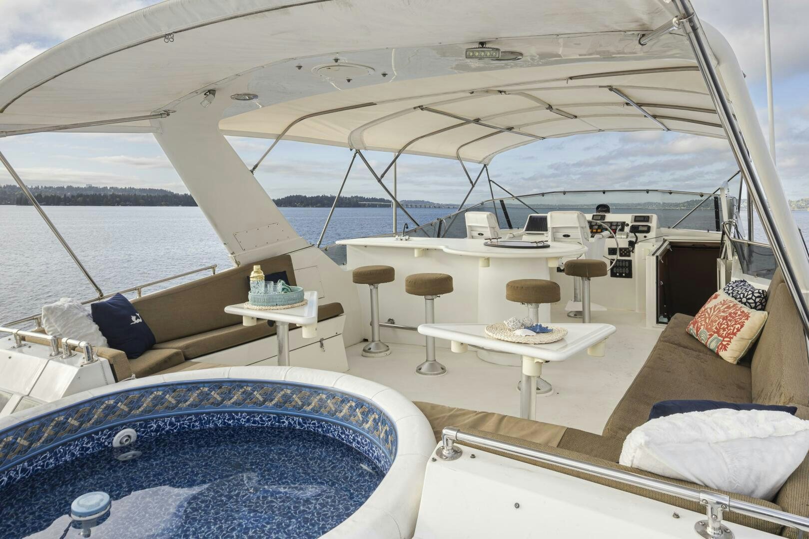 a boat with a table and chairs aboard LISA SEA I Yacht for Sale