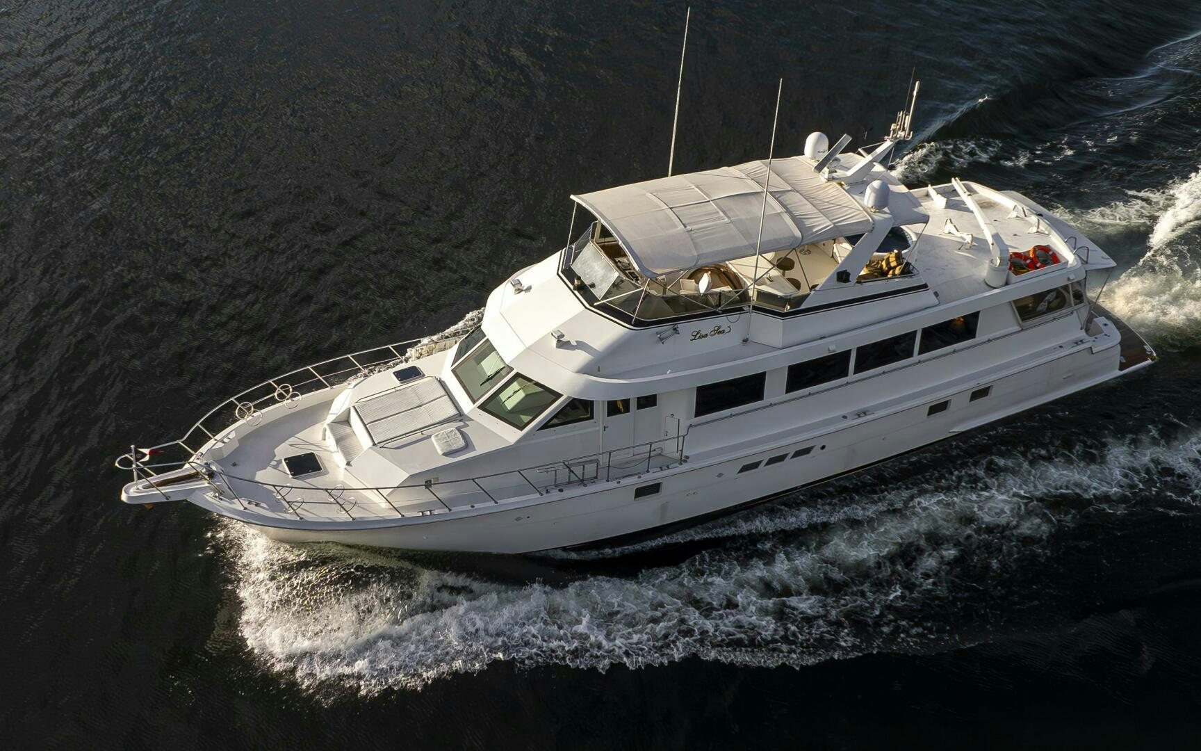 a white yacht in the water aboard LISA SEA I Yacht for Sale