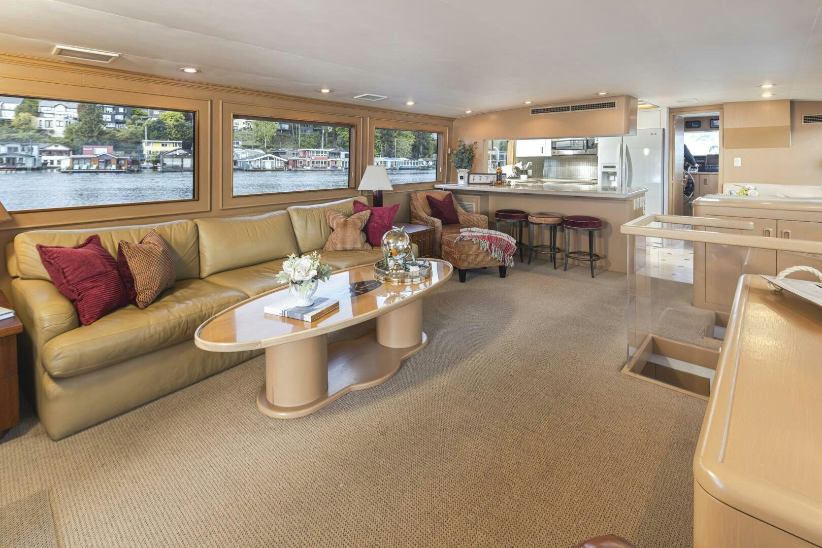 a living room with a couch and a coffee table aboard LISA SEA I Yacht for Sale