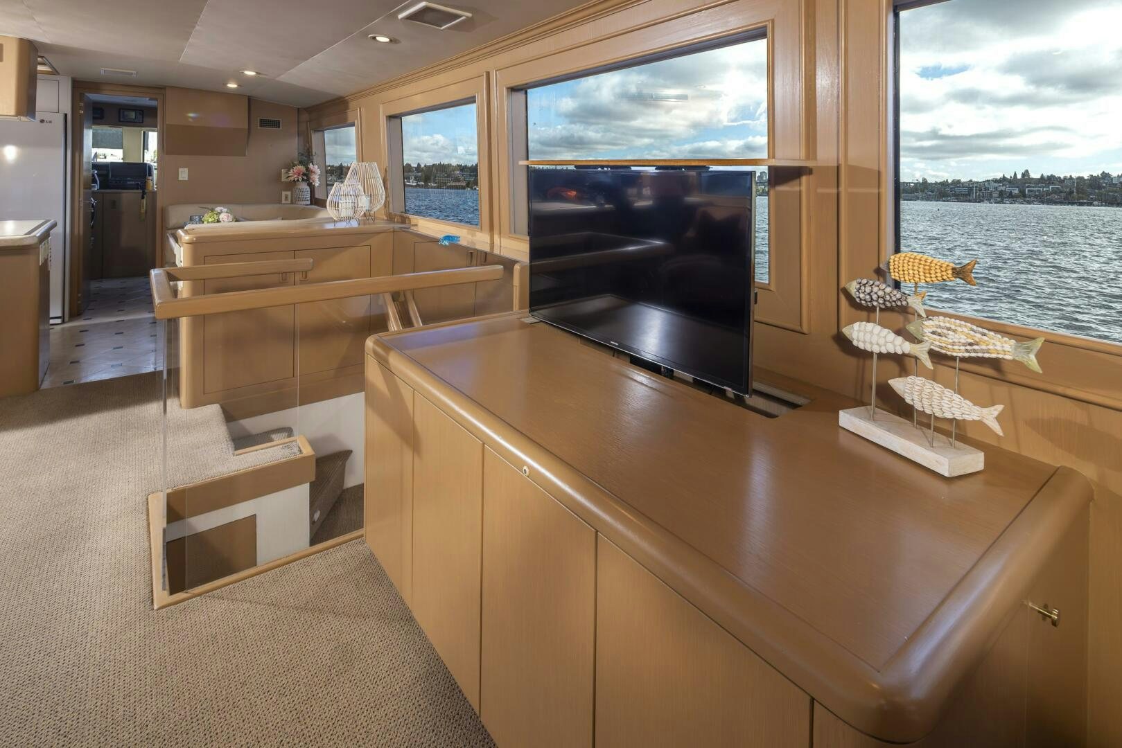 a kitchen with a large island aboard LISA SEA I Yacht for Sale