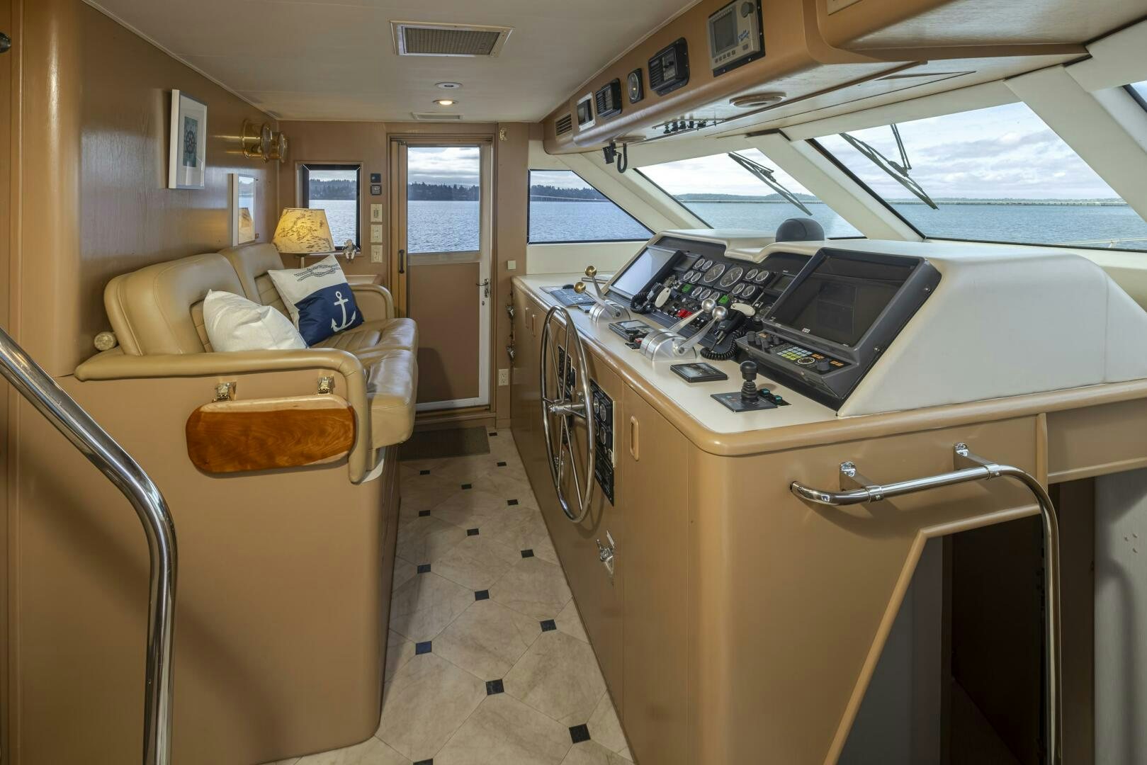 a room with a bed and a desk aboard LISA SEA I Yacht for Sale