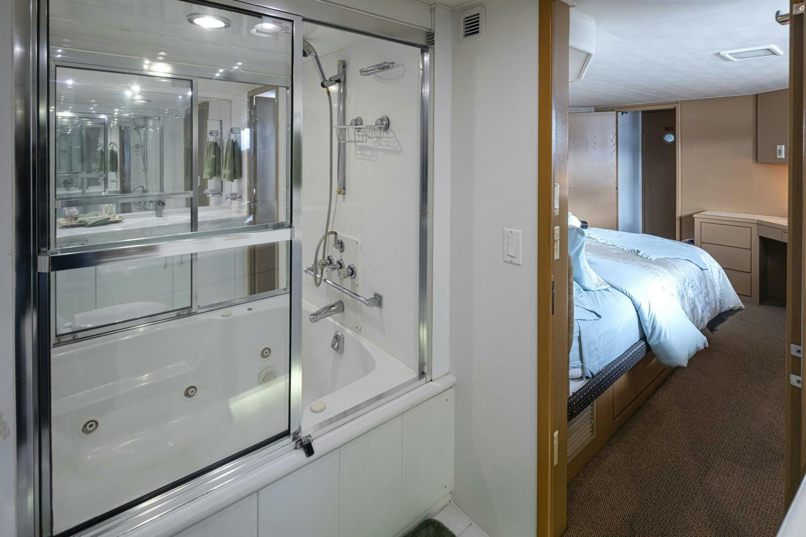 a hospital room with a bed and a sink aboard LISA SEA I Yacht for Sale