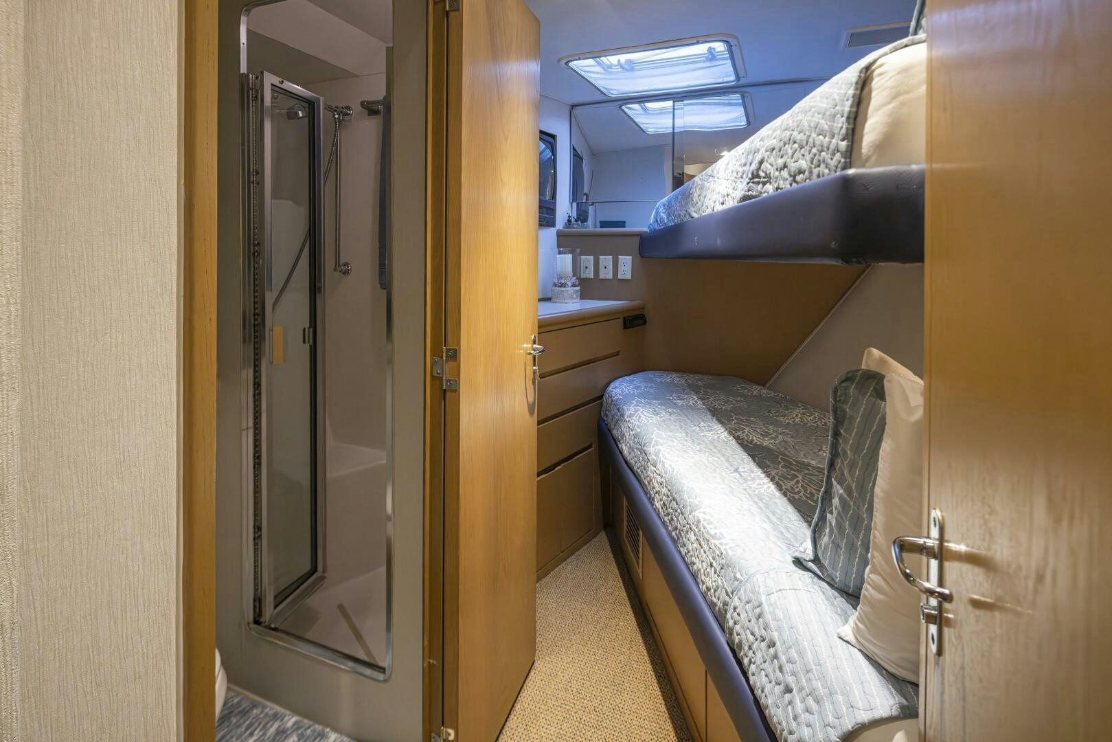a bed in a room aboard LISA SEA I Yacht for Sale