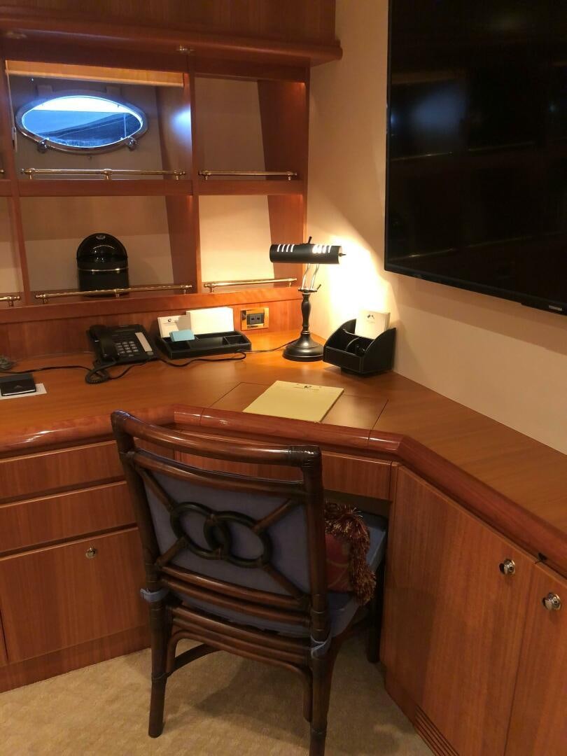a chair in a room aboard ENCHANTRESS Yacht for Sale